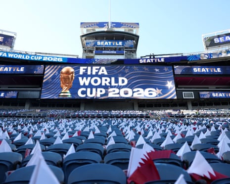 Flags have been placed on seats inside the groud.