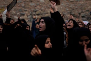 Women chant slogans during a protest outside the Swedish consulate in Istanbul