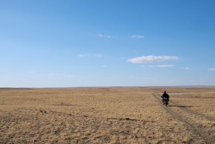 Ganzorig Tserenchimed and his wife drive across the steppe to their ger.