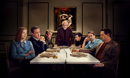 A scene from Succession, with the cast standing and sitting around a board table
