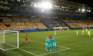 Barcelona celebrate a sublime third goal.