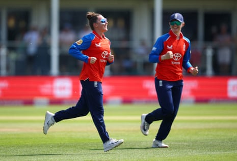 England's Linsey Smith and Maia Bouchier celebrate after taking the wicket of New Zealand's Brooke Halliday.