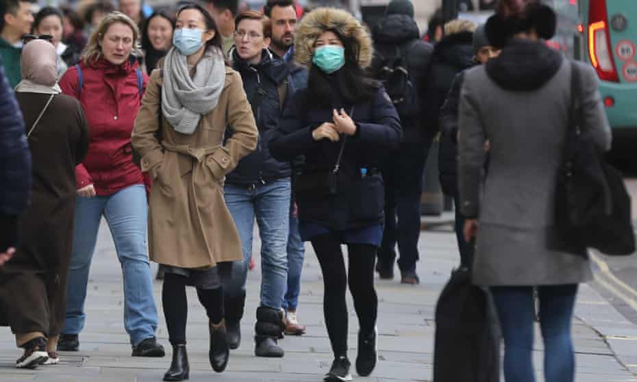 People wearing medical masks in central London