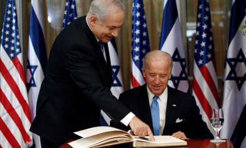 Joe Biden, then the US vice president, prepares to sign the guestbook before his meeting with Israeli Prime Minister Benjamin Netanyahu in Jerusalem in 2010.