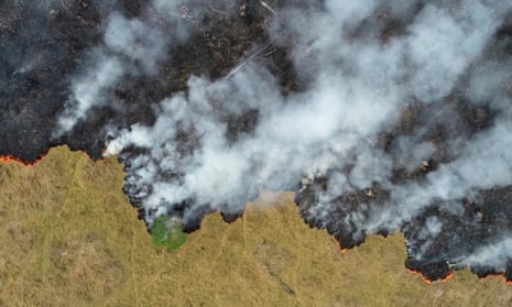 Smoke rise over a deforested plot of the Amazon jungle in Porto Velho, Rondonia state, Brazil, last August.
