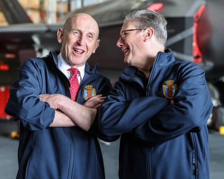 John Healey and Keir Starmer with their arms folded and laughing