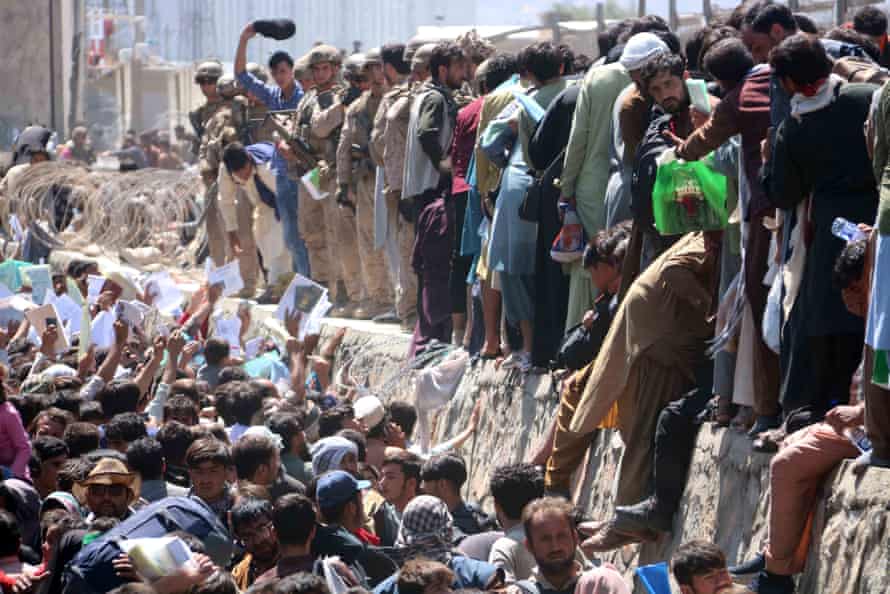 Afghans are fighting to flee Kabul airport on August 26, the day of the Abbey Gate bombing.