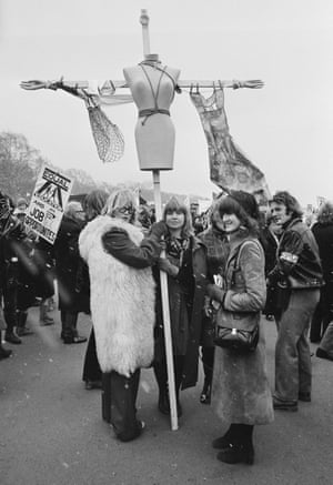 Demonstrators at Speaker’s Corner in Hyde Park rally under symbols of subjection of women: a silk stocking, a shopping bag, an apron and washing-up gloves attached to a mannequin