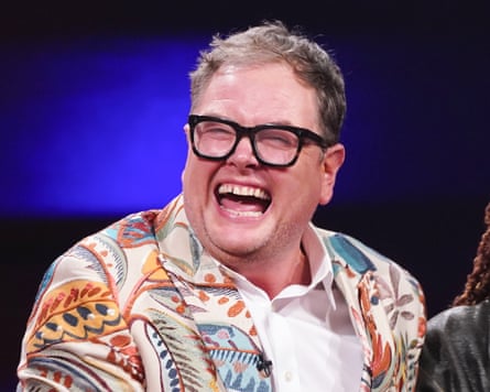 Alan Carr laughing
