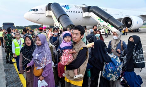 The first group of Indonesians evacuated from Sudan arriving at Soekarno-Hatta international airport in Jakarta.