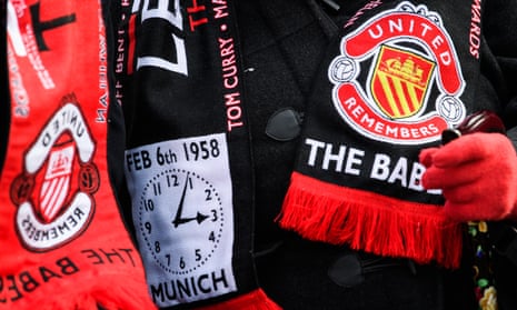 Manchester United fans pay their respects at a memorial service in Munich.