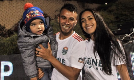 Carlos Álvarez with his wife, Renae Cuéllar, and their son at a San Diego Loyal game