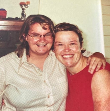 Two women, arms round each other, in an old snapshot