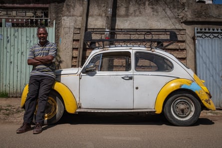 Esayas Gezaghe with his VW Beetle in Addis Abada, Ethiopia