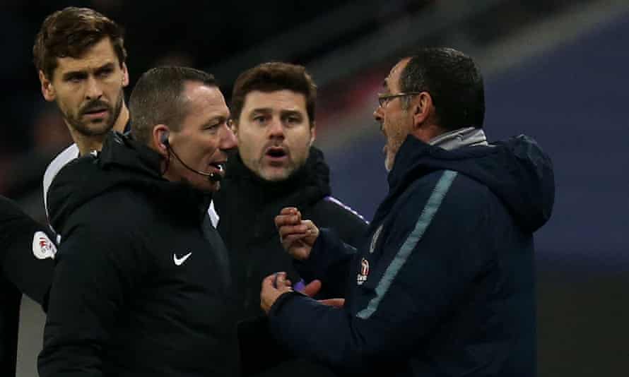 Maurizio Sarri (right) complains to the fourth official during Chelsea’s defeat.