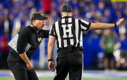Missouri head coach Eli Drinkwitz argues with an official during the Tigersâ 38-21 win over Kansas on Friday night in Lawrence.