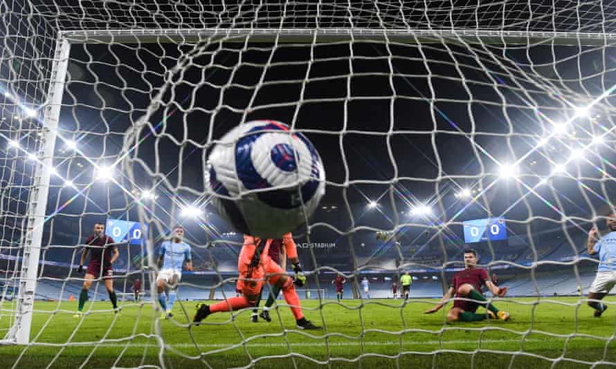 Leander Dendoncker’s own goal for Wolves gives Manchester City the lead.