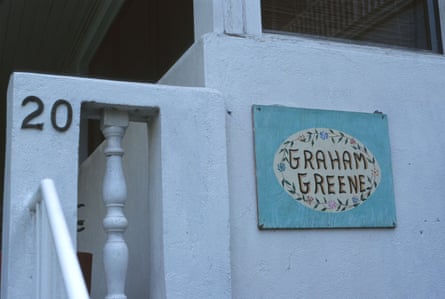A sign reads ‘Graham Greene’ next to one of the hotels rooms.