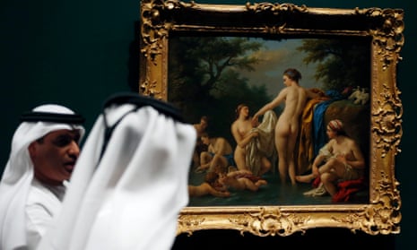 Emirati visitors look at Venus and Nymphs Bathing by Louis Jean-Francois Lagrenee, which will be displayed at the Louvre Abu Dhabi