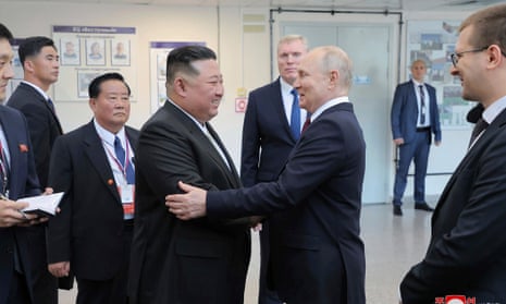 Vladimir Putin welcomes Kim Jong-un to the Vostochny cosmodrome in far eastern Russia on Wednesday