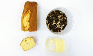 Black soldier fly larvae, extracted fat and a piece of cake at Ghent University.