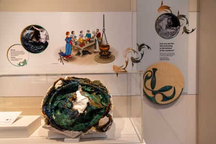 The cauldron in a display case at the museum