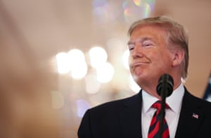 Trump reacts to questions during a joint press conference with Morrison.