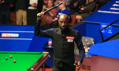 Rory McLeod celebrates following his shock victory over Judd Trump on day five of the World Championship in Sheffield