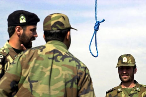 police officers stand near a noose