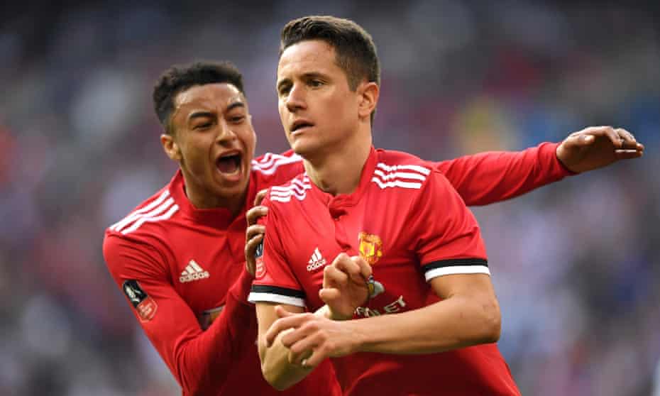 Jesse Lingard congratulates Ander Herrera after the Spaniard’s winner against Tottenham, which booked Manchester United’s place in the FA Cup final. 