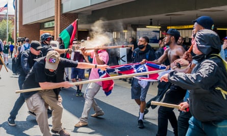 White supremacist groups clash with counter-protesters during Unite the Right rally in Charlottesville, Virginia on 12 August 2017.