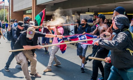 Far-right rally members clash with counter-protesters at the ‘Unite the Right’ rally in Charlottesville, Virginia, in 2017. Photograph: Michael N/Pacific/BarcroftImages