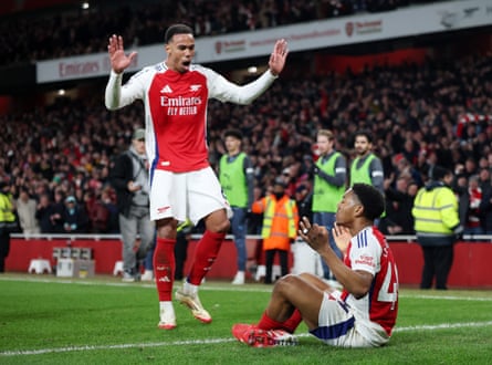 Myles Lewis-Skelly of Arsenal celebrates scoring his team’s third goal against Manchester City at the Emirates Stadium