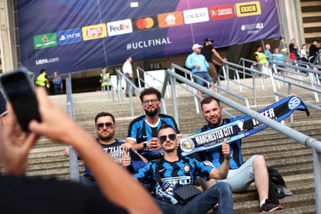 Inter fans pose outside the Ataturk Stadium.