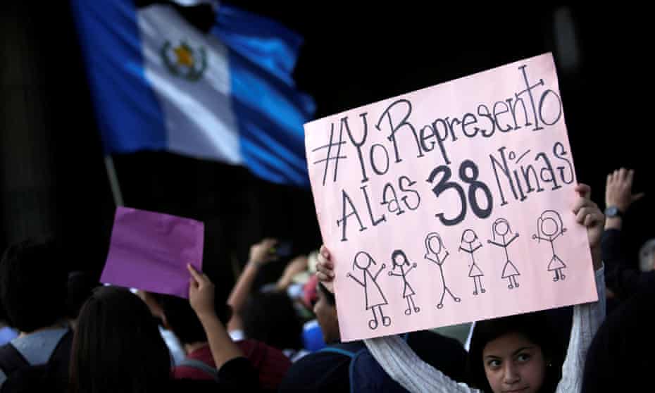 A girl holds a sign reading ‘I represent the 38 girls’ as protesters outside the national palace in Guatemala City demand justice for the victims of a fire at the Virgen de la Asunción children’s shelter