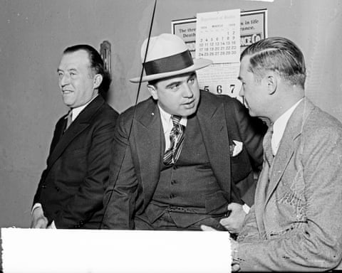 Al Capone speaks to an attorney in 1929.