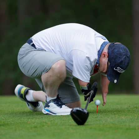 Tony Lloyd, from the Shropshire golf club, sets up his tee shot on the 10th hole