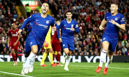 Eden Hazard (left) celebrates his stunning winner against Liverpool in the Carabao Cup tie at Anfield.