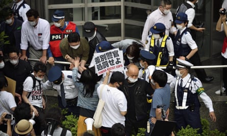 People protest against police violence in Tokyo.