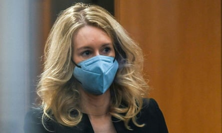 The Theranos founder and CEO, Elizabeth Holmes, goes through security after arriving for court at the Robert F Peckham federal building in San Jose, California.