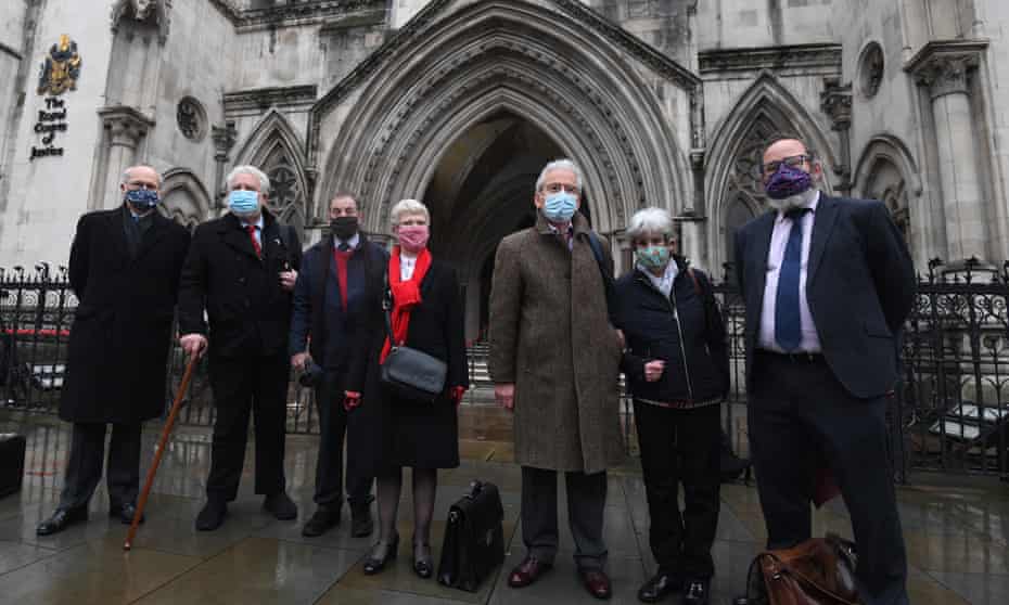 Left to right: Mark Turnbull, Terry Renshaw, Harry Chadwick, Eileen Turnbull, John McKinsie Jones with his wife Rita McKinsie Jones and lawyer Jamie Potter, outside the The Royal Courts Of Justice, London