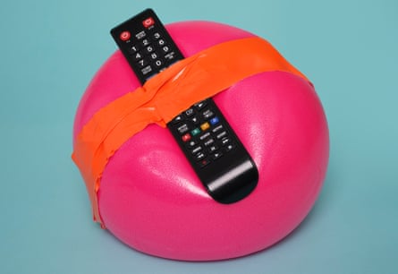 A TV remote control taped to an exercise ball