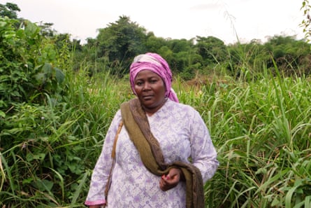 Annie Sinanduku Mwange in a field where a new quarry was recently dug by local people near Kailo.