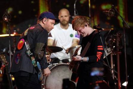 Jonny Buckland of Coldplay and Ed Sheeran.