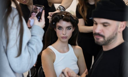 A model looks at the camera