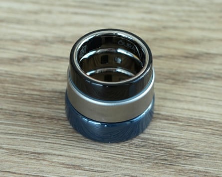 The Oura Ring 5 stacked on top of the Ring 4 and Ring 4 Ceramic.