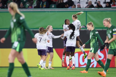 Manchester United’s Fridolina Rolfö (third right) jumps to celebrate opening the scoring at Wolfsburg.