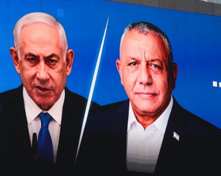 A billboard shows Benjamin Netanyahu and Gadi Eisenkot.