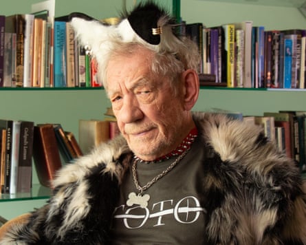 Ian McKellen as Toto the dog, complete with a pair of furry ears and a fluffy coat