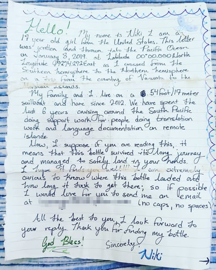 Message in a bottle. A note dropped by American teenager Niki Nie from a sailboat that washed up on a remote Papua New Guinean island